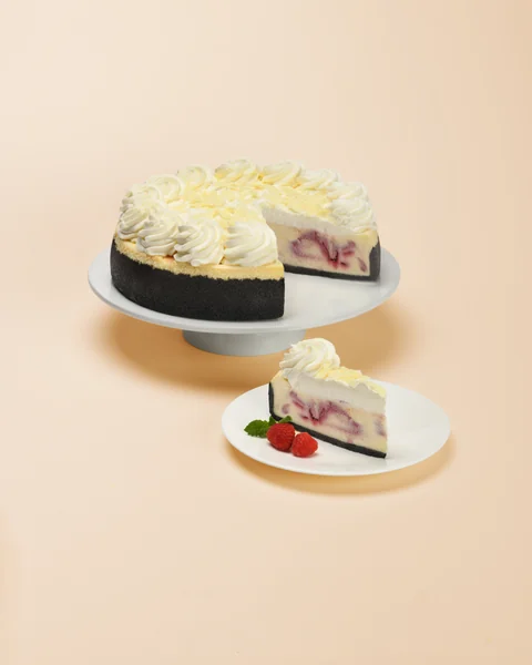 White Chocolate Raspberry — whole cake and plated slice