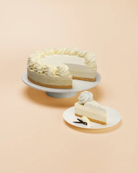 Vanilla Bean Cheesecake — whole cake and plated slice